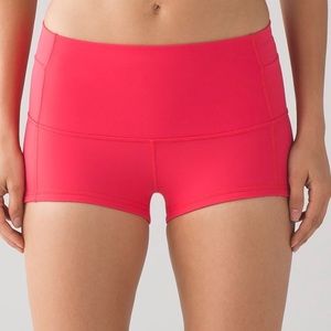 Coral lululemon shorts.